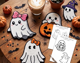 May include: Three white ghost punch needle projects with accessories including a pink bow, an orange bow, and a purple wizard hat. Two white paper punch needle templates by Poko Design are included, along with a metal punch needle tool and yarn.