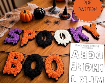 May include: A punch needle pattern set featuring two banners spelling SPOOKY and BOO in orange, purple, black, and white yarn. The set includes a printed PDF template sheet with alphabet letters in a dripping font style for DIY crafting projects.