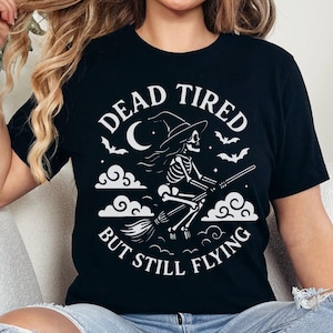 Dead Tired But Still Flying Shirt, Funny Witch Shirt, Skeleton Witch on Broom Tee, Spooky Season Halloween Shirt, Witch Gift Idea for Her