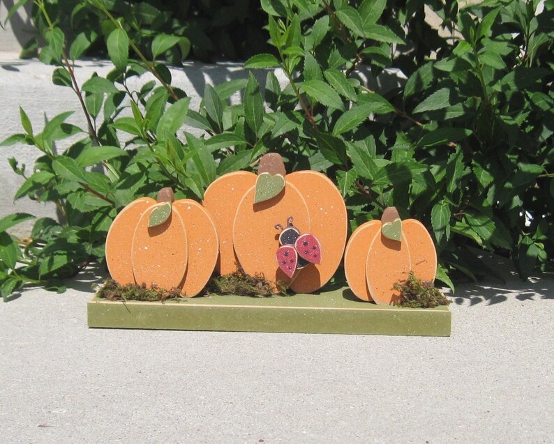 TRIPLE PUMPKINS on a base with a ladybug for home decor, porch, Autumn and Fall decor image 1