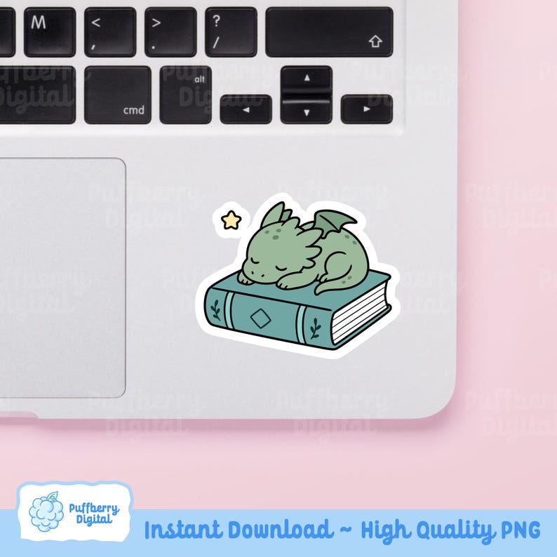May include: A green dragon sticker sleeping on a blue book with a star. The sticker is on a laptop. The text "Instant Download ~ High Quality PNG" is at the bottom.
