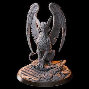 May include: A grey, detailed, 3D printed sculpture of a female griffin with wings spread, sitting on a rocky base. The griffin has a human-like head and torso, with a lion-like body and feathered wings.