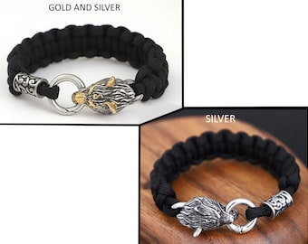Pulsera de supervivencia de acero inoxidable con diseño de lobo celta y cuerda de paracord para hombre