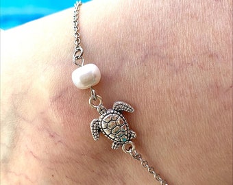 Tobillera de acero inoxidable con forma de tortuga y perla de agua dulce, ajustable, sin deslustre.