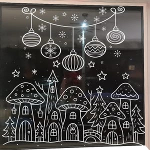 May include: White line art illustration on a black background. The design features hanging Christmas ornaments, snowflakes, and stars above a whimsical mushroom village with trees and houses. The artwork is framed in a white border.