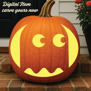 May include: A large orange pumpkin with a brown stem featuring a carved face design in bright yellow. The face has two circular eyes and a wavy mouth. The text "Digital Item carve yours now" is visible in the upper left corner of the image.