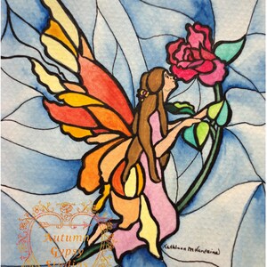 May include: A watercolor painting of a fairy with orange and yellow wings, wearing a pink dress, and smelling a pink rose. The background is a blue and white watercolor wash.