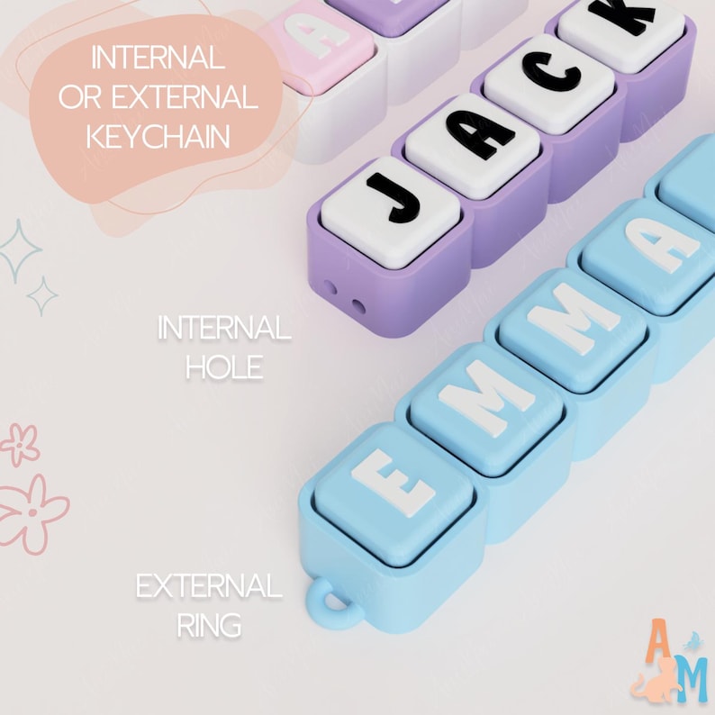 May include: Two custom name keychains made of square blocks. One keychain is purple with white blocks spelling JACK in black letters. The other is light blue with white blocks spelling EMMA in white letters. Each features an internal hole or external ring.