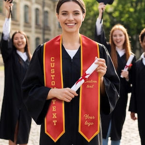 May include: A group of graduates in black gowns and mortarboards celebrate. One graduate holds a diploma and a red sash with gold text that reads "CUSTOM TEXT" and "Your logo". The background includes a university building and trees.