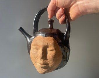 Teapot face sculpture art pottery marbled stoneware agateware buddha vessel surreal head pot wax resist