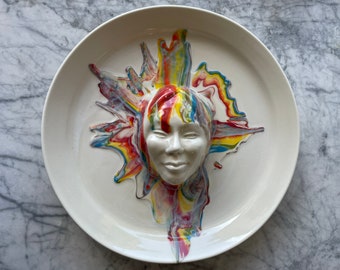 Face sculpture wall hanging platter portrait relief fruit bowl figure art pottery plate head of a woman halo marbled porcelain rainbow drips