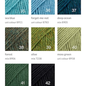 May include: Yarn samples in various colors, including sea blue, forget-me-not, deep ocean, forest, olive, moss green, dark ivy, and black. Each sample is labeled with a number and a color name.