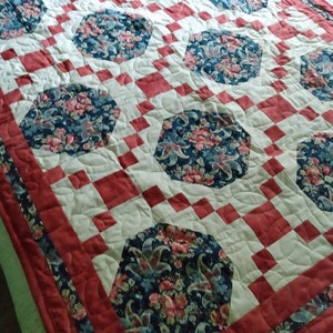 Coral and navy paisley quilt