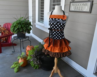 The Witch Is In -Retro Fall - Halloween Apron – Limited  number this year. Black, White & Orange Ruffles -Women's Halloween Apron