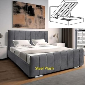 May include: A grey upholstered bed frame with a tufted headboard and a storage compartment. The bed frame has a lift-up mechanism for easy access to the storage space. The bed frame is labelled "Steel Plush".