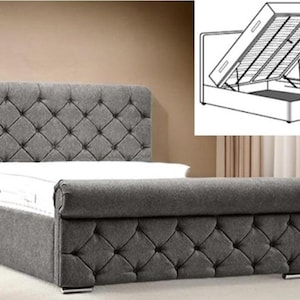 May include: A grey upholstered bed frame with a tufted headboard and footboard. The bed frame has a storage compartment that can be accessed by lifting the mattress.