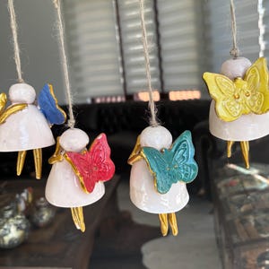 Wind Chime -Bell Chimes, Angel Figured Window Front -Patio Ornament- Set of 2 red / blue hanging bells