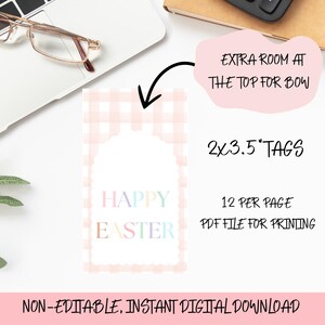 May include: Printable Easter gift tags with a pink and white gingham pattern. The tags are 2 x 3.5 inches and say "Happy Easter" in rainbow colors. There is room at the top for a bow.