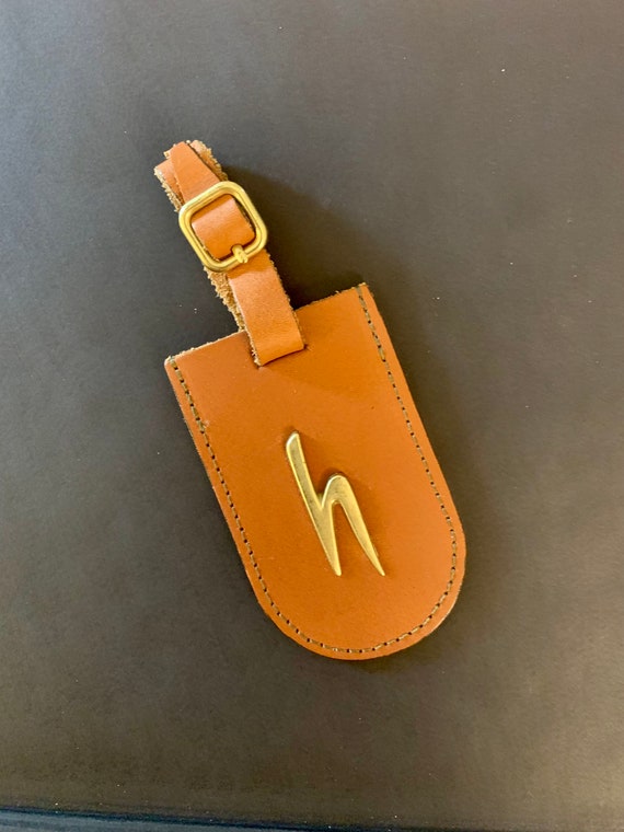 Louis Vuitton Leather Luggage Tag (SHF-vGlw4Q) – LuxeDH