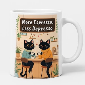 May include: White ceramic mug featuring a whimsical illustration of two black cats at a coffee shop. The cats are seated at a bar, holding mugs, with the text "More Espresso, Less Depresso" above them. The mug has a curved handle.