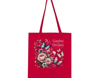 May include: Red tote bag with a floral design and butterflies. The text "Garden of Dreams" is printed on the bag.