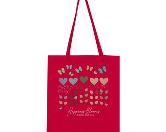 May include: Red tote bag with a design of colorful butterflies and hearts with the text "Happiness Blooms From Within".