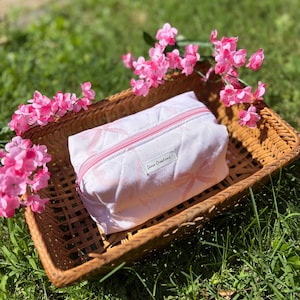 Bolsa de maquillaje acolchada Eldoie: una bonita y moderna bolsa de cosméticos acolchada.