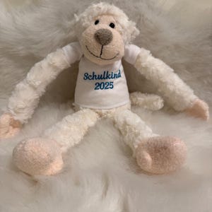 Stuffed animal hanging monkey