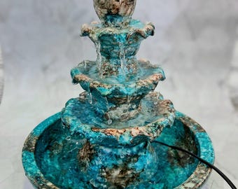 Handcrafted clay fountain with 3 water levels and rain-like sound. Ideal for desktops, meditation, or relaxing home decor. 12 inches tall