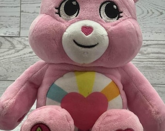 Peluche vintage Pink Cheer Bear : peluche ours en peluche arc-en-ciel, ventre de soins