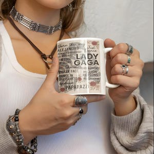 Lady Gaga Collage Mug: Iconic Songs, Floral Accents