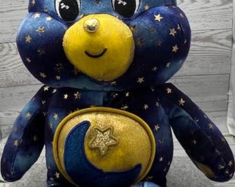 Les oursons déverrouillent l'ours porte-bonheur magique Nuit étoilée,