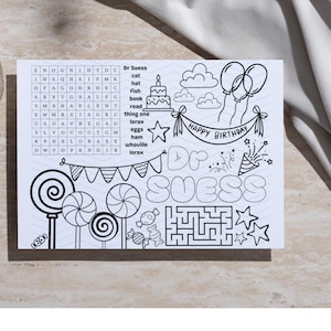 May include: Black and white Dr. Seuss themed birthday coloring page. Features a word search, a maze, and birthday-themed illustrations such as balloons, a cake, and candy. The words "Happy Birthday" are written on a banner.