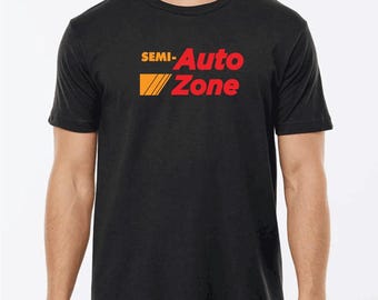 May include: A black t-shirt with the text "SEMI-Auto Zone" in red and orange lettering.