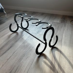 Estante para botas de herradura