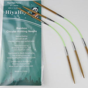 May include: Bamboo circular knitting needles with a light green flexible cable and silver metal tips. The needles are 8 inches long. The packaging includes the text "HiyaHiya Flyers" and "Bamboo Circular Knitting Needle".