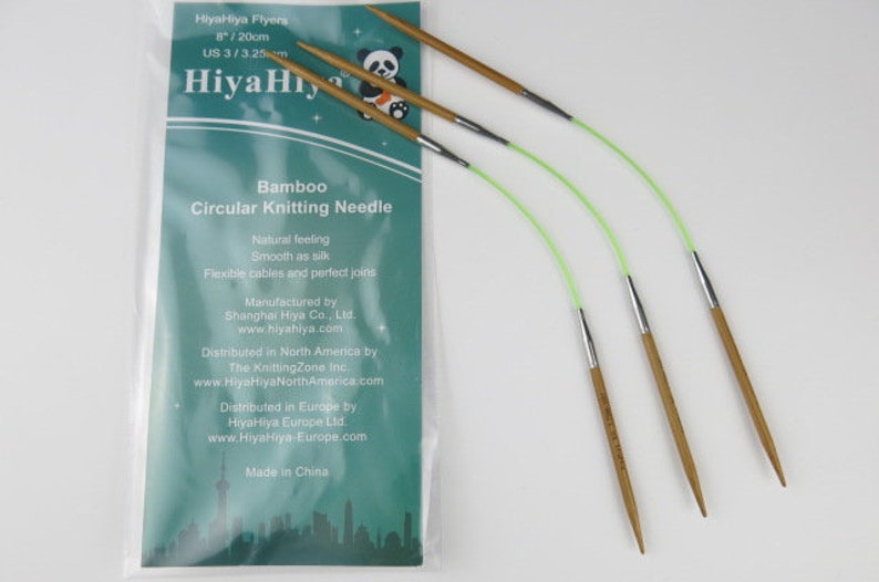 May include: Bamboo circular knitting needles with a light green flexible cable and silver metal tips. The needles are 8 inches long. The packaging includes the text "HiyaHiya Flyers" and "Bamboo Circular Knitting Needle".