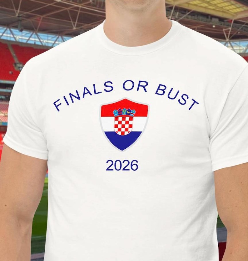 May include: White t-shirt with the text "FINALS OR BUST" in blue, a Croatian flag shield, and the year "2026" in blue.