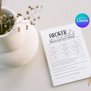May include: A white paper with the text "BROKER open house feedback WHAT DID YOU THINK?" and a series of rating options. A gold pen rests on the right side. A white vase with dried plants is in the background.