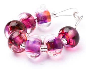 Handmade lampwork bead set of 7 magenta and pink swirly beads