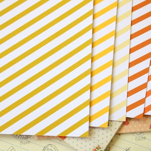 Papier cartonné imprimé rayures jaunes bonbon 250 g/m²