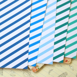 Papier cartonné imprimé rayures bleu bonbon 250 g/m²