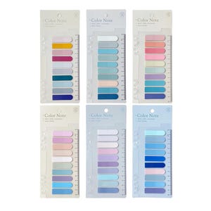 May include: Six sets of Color Note adhesive index tabs on backing cards. Each card features ten rectangular tabs in various colours, including shades of blue, pink, yellow, and grey. The cards include a printed ruler along the side edge.