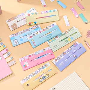 May include: Assortment of colourful sticky note sets with cute animal illustrations. Each set has a different theme, including "Milk", "Fruit", "Happy", "Strawberry", "Sweet", and "Cat".