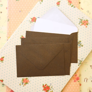 Mini-enveloppes et cartes de correspondance nacrées bronze