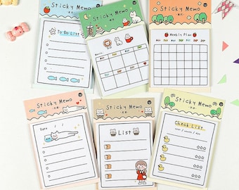 May include: A set of eight colorful sticky note pads with different designs and layouts. Each pad features a cute cartoon animal and a different type of list, including to-do, weekly plan, check list, and more.