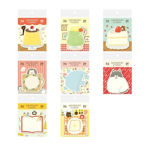 May include: A set of 8 colourful sticky note pads with various cute illustrations. Each pad has 20 sheets and features a different design, including a cat, a bird, a cake, a pudding, a cup of tea, and a slice of bread. The pads are labelled "KATANUKI FUSEN" and have a number "20" printed on them.