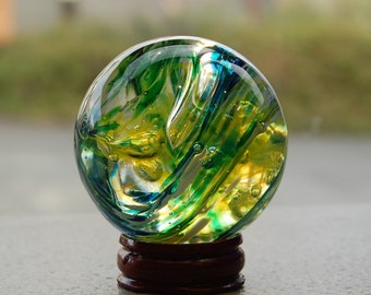 Glass Marble in Blue, Green, and Yellow