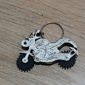 Vector, llavero moto (llantas con movimiento)