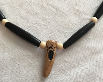bear paw print necklace, deer antler, black horn hair pipe, round bone beads